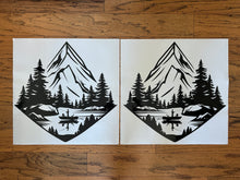 Load image into Gallery viewer, Die cut vinyl decal for cornhole boards depicting mountains lake and a fisherman fishing from a boat 